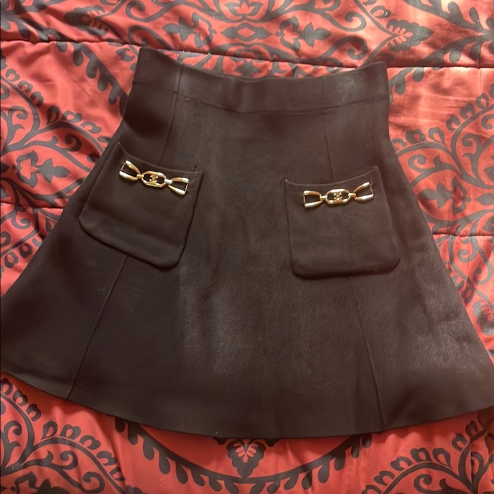 Chic Black Mini Skirt with Gold Details